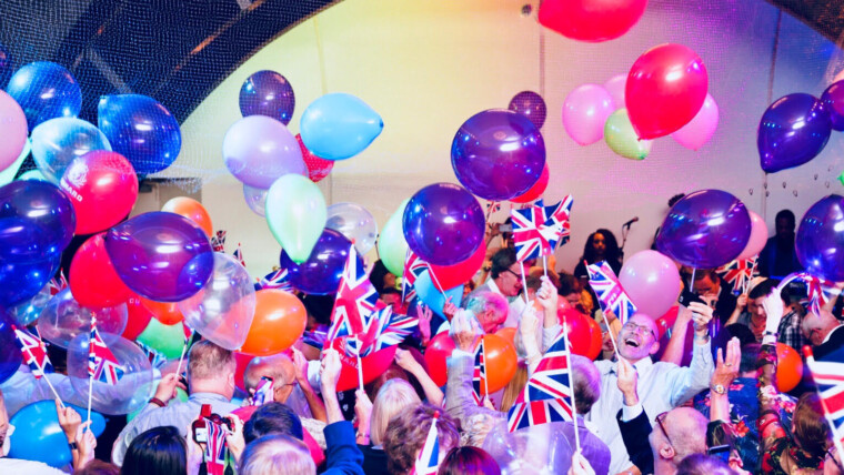 Celebrating reaching the end of Queen Mary II Voyage